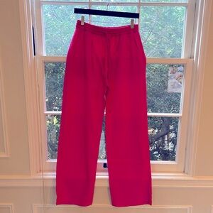 Zara pink joggers with elastic tie waist and side pockets.